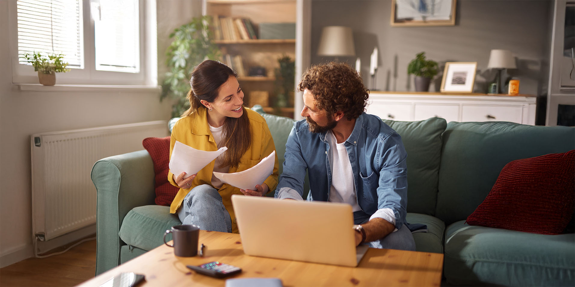Couple in living room discussing