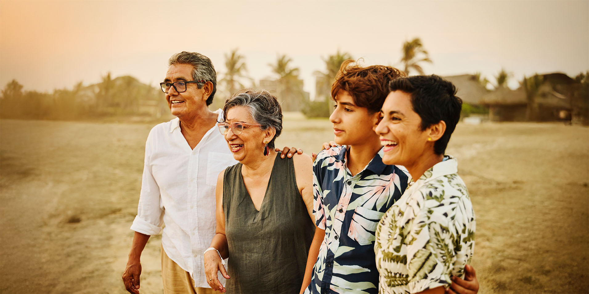 Family of four smiling outdoor